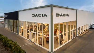 Prikaz zunanjosti prodajno-servisnega salona Dacia.