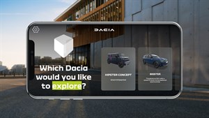 Na sliki je pametni telefon, ki prikazuje uporabniški vmesnik za izbiro med dvema modeloma znamke Dacia.